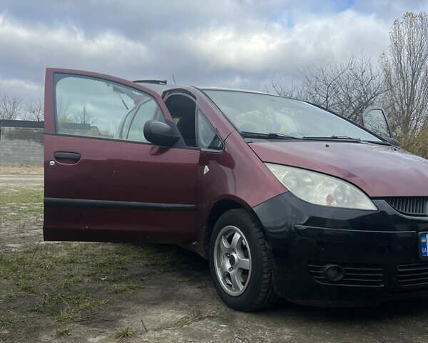 Червоний Міцубісі Кольт, об'ємом двигуна 1.4 л та пробігом 241 тис. км за 3300 $, фото 9 на Automoto.ua