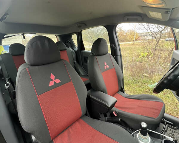 Червоний Міцубісі Кольт, об'ємом двигуна 1.4 л та пробігом 241 тис. км за 3300 $, фото 1 на Automoto.ua