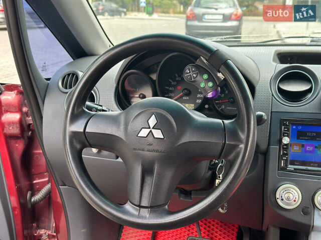 Червоний Міцубісі Кольт, об'ємом двигуна 1.33 л та пробігом 250 тис. км за 3999 $, фото 18 на Automoto.ua