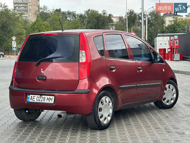 Червоний Міцубісі Кольт, об'ємом двигуна 1.33 л та пробігом 250 тис. км за 3999 $, фото 3 на Automoto.ua