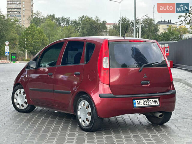Червоний Міцубісі Кольт, об'ємом двигуна 1.33 л та пробігом 250 тис. км за 3999 $, фото 5 на Automoto.ua