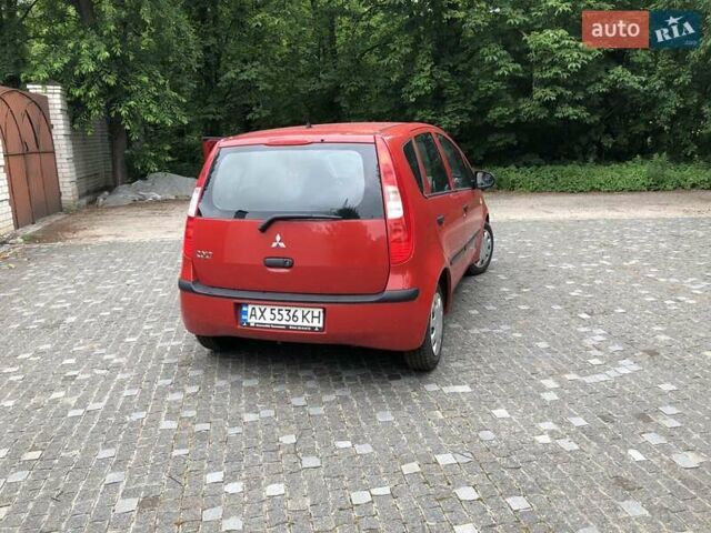 Червоний Міцубісі Кольт, об'ємом двигуна 1.12 л та пробігом 210 тис. км за 3300 $, фото 4 на Automoto.ua