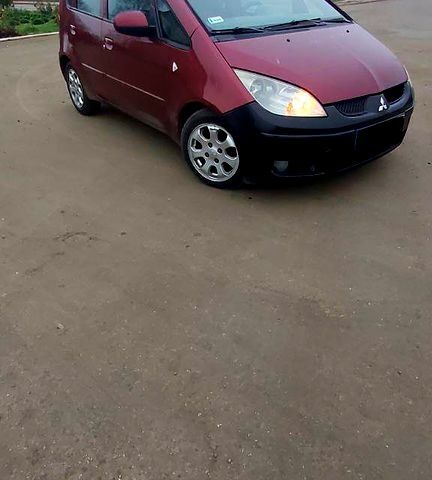 Красный Мицубиси Кольт, объемом двигателя 1.5 л и пробегом 240 тыс. км за 1600 $, фото 1 на Automoto.ua