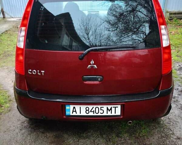 Красный Мицубиси Кольт, объемом двигателя 1.3 л и пробегом 216 тыс. км за 4100 $, фото 1 на Automoto.ua