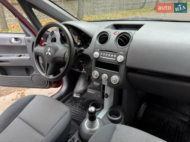 Червоний Міцубісі Кольт, об'ємом двигуна 1.33 л та пробігом 156 тис. км за 3800 $, фото 17 на Automoto.ua