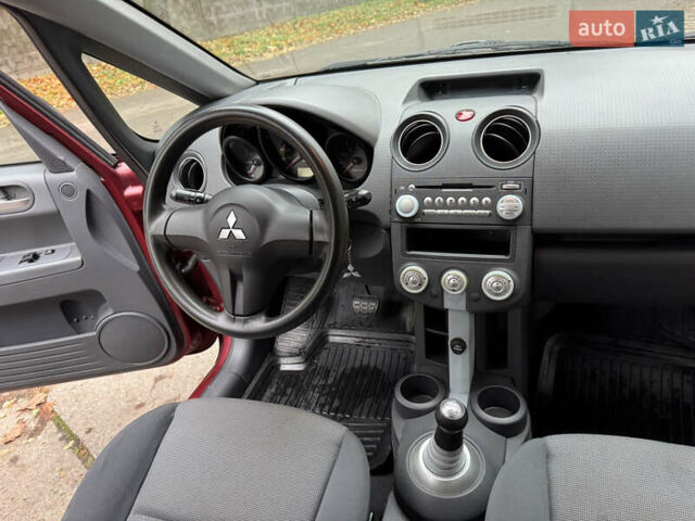 Червоний Міцубісі Кольт, об'ємом двигуна 1.33 л та пробігом 156 тис. км за 3800 $, фото 22 на Automoto.ua