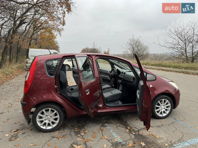 Червоний Міцубісі Кольт, об'ємом двигуна 1.33 л та пробігом 156 тис. км за 3800 $, фото 49 на Automoto.ua