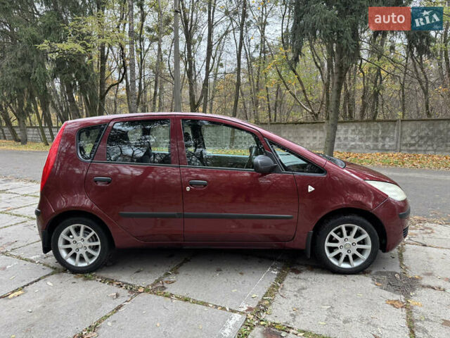 Червоний Міцубісі Кольт, об'ємом двигуна 1.33 л та пробігом 156 тис. км за 3800 $, фото 7 на Automoto.ua