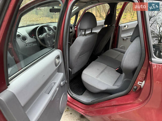 Червоний Міцубісі Кольт, об'ємом двигуна 1.33 л та пробігом 156 тис. км за 3800 $, фото 14 на Automoto.ua