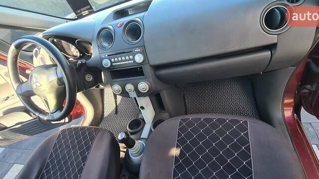 Міцубісі Кольт 2006 у Хмельницькому на Automoto.ua Червоний Міцубісі Кольт, об'ємом двигуна 1.33 л та пробігом 230 тис. км за 3700 $, фото 12 на Automoto.ua