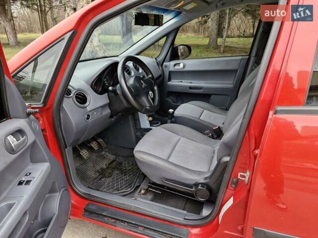 Красный Мицубиси Кольт, объемом двигателя 1.33 л и пробегом 241 тыс. км за 2850 $, фото 10 на Automoto.ua