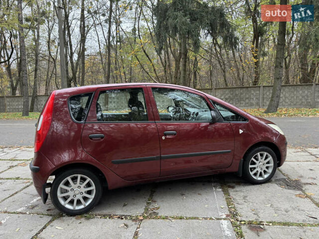 Червоний Міцубісі Кольт, об'ємом двигуна 1.33 л та пробігом 156 тис. км за 3800 $, фото 6 на Automoto.ua