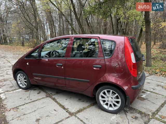 Червоний Міцубісі Кольт, об'ємом двигуна 1.33 л та пробігом 156 тис. км за 3800 $, фото 3 на Automoto.ua