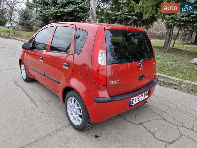 Красный Мицубиси Кольт, объемом двигателя 1.33 л и пробегом 241 тыс. км за 2850 $, фото 5 на Automoto.ua
