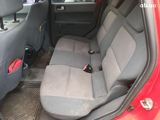 Червоний Міцубісі Кольт, об'ємом двигуна 1.3 л та пробігом 184 тис. км за 3940 $, фото 9 на Automoto.ua