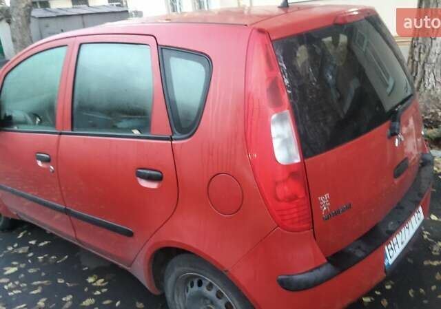 Червоний Міцубісі Кольт, об'ємом двигуна 1.12 л та пробігом 252 тис. км за 4000 $, фото 3 на Automoto.ua