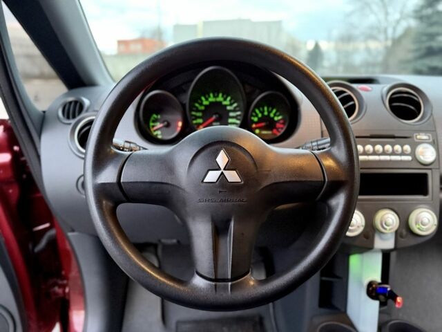 Червоний Міцубісі Кольт, об'ємом двигуна 1.3 л та пробігом 127 тис. км за 4999 $, фото 17 на Automoto.ua