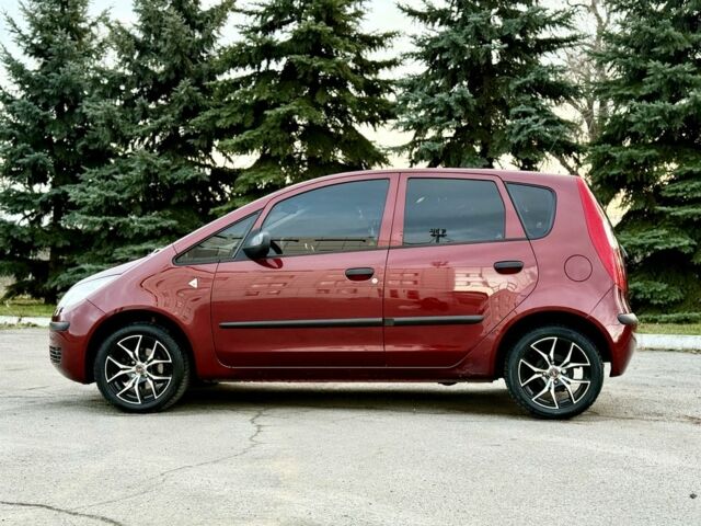 Червоний Міцубісі Кольт, об'ємом двигуна 1.3 л та пробігом 127 тис. км за 4999 $, фото 4 на Automoto.ua