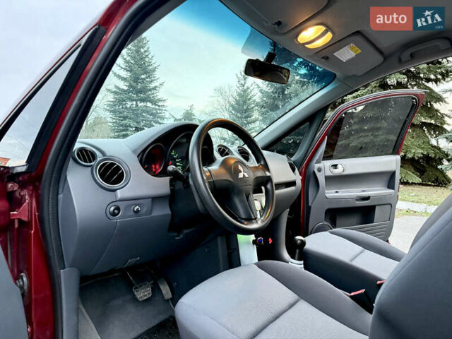 Червоний Міцубісі Кольт, об'ємом двигуна 1.3 л та пробігом 127 тис. км за 4999 $, фото 11 на Automoto.ua