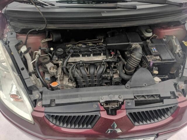 Красный Мицубиси Кольт, объемом двигателя 1.3 л и пробегом 143 тыс. км за 4100 $, фото 5 на Automoto.ua