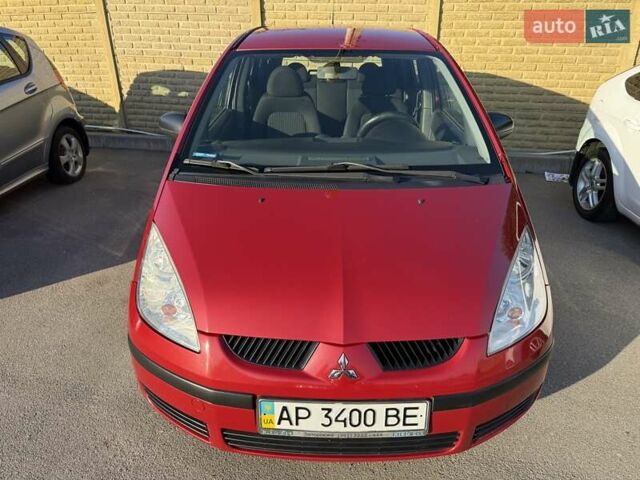 Красный Мицубиси Кольт, объемом двигателя 1.3 л и пробегом 168 тыс. км за 4999 $, фото 2 на Automoto.ua