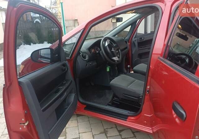 Красный Мицубиси Кольт, объемом двигателя 1.33 л и пробегом 132 тыс. км за 5890 $, фото 44 на Automoto.ua