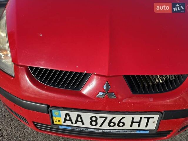 Міцубісі Кольт 2008 у Києві на Automoto.ua Червоний Міцубісі Кольт, об'ємом двигуна 1.33 л та пробігом 211 тис. км за 5000 $, фото 12 на Automoto.ua