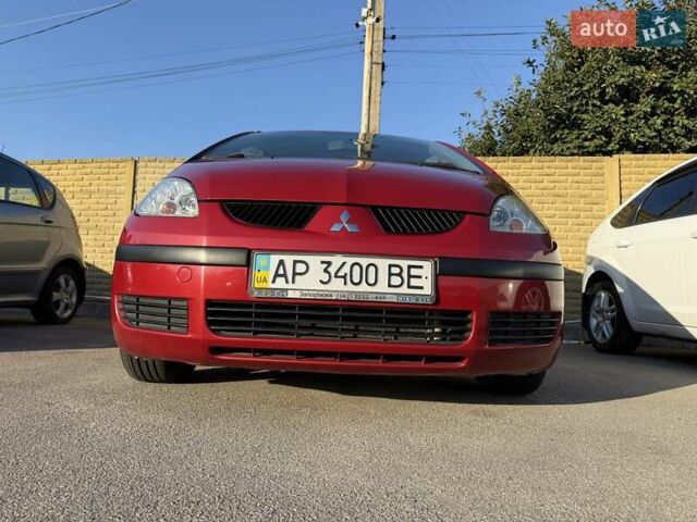 Красный Мицубиси Кольт, объемом двигателя 1.3 л и пробегом 168 тыс. км за 4999 $, фото 4 на Automoto.ua