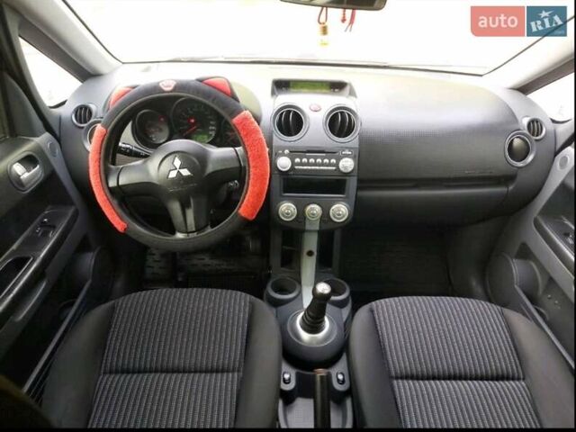 Червоний Міцубісі Кольт, об'ємом двигуна 1.33 л та пробігом 210 тис. км за 4500 $, фото 3 на Automoto.ua