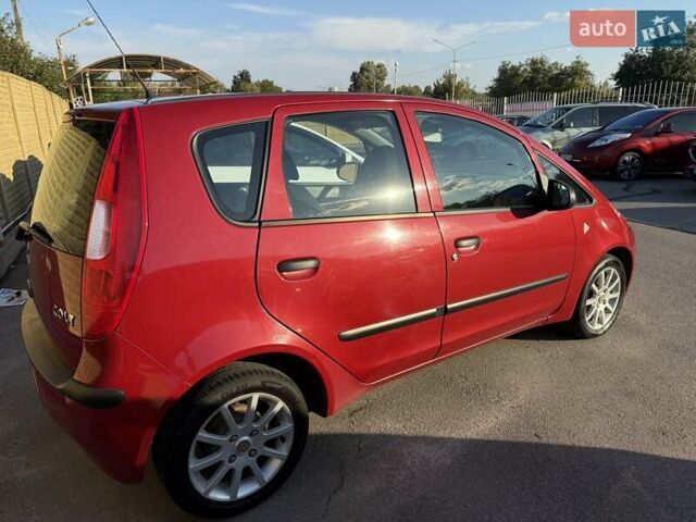 Красный Мицубиси Кольт, объемом двигателя 1.3 л и пробегом 168 тыс. км за 4999 $, фото 5 на Automoto.ua