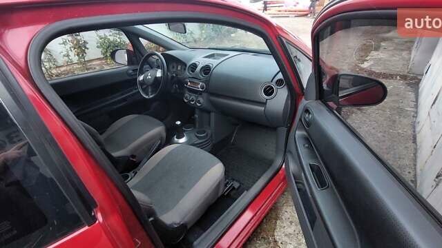 Червоний Міцубісі Кольт, об'ємом двигуна 1.33 л та пробігом 118 тис. км за 5500 $, фото 8 на Automoto.ua
