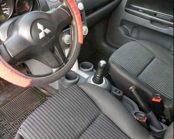 Червоний Міцубісі Кольт, об'ємом двигуна 1.33 л та пробігом 210 тис. км за 4500 $, фото 10 на Automoto.ua