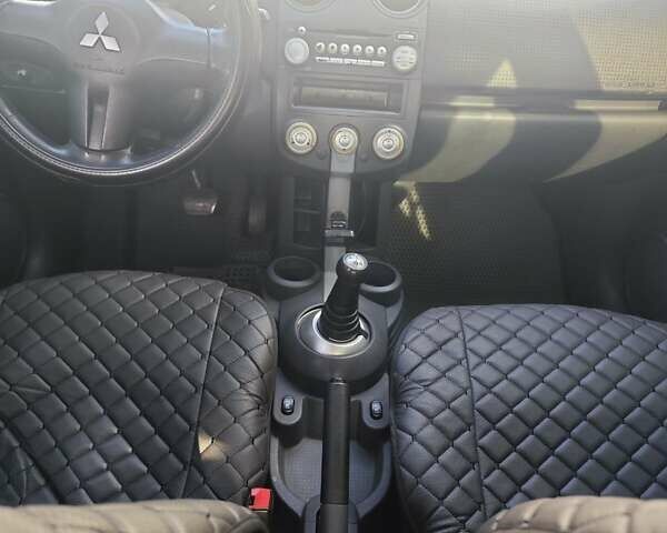 Червоний Міцубісі Кольт, об'ємом двигуна 1.33 л та пробігом 311 тис. км за 4800 $, фото 13 на Automoto.ua