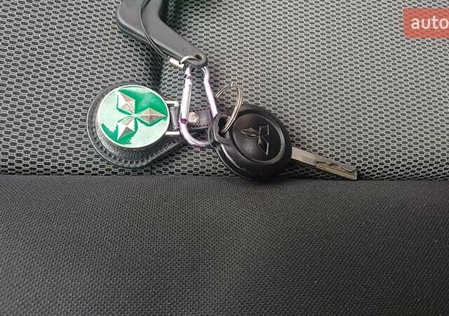 Красный Мицубиси Кольт, объемом двигателя 1.33 л и пробегом 132 тыс. км за 5890 $, фото 61 на Automoto.ua