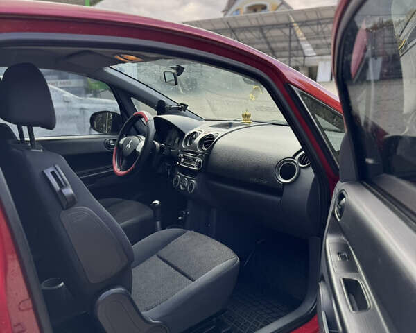 Червоний Міцубісі Кольт, об'ємом двигуна 1.12 л та пробігом 128 тис. км за 3599 $, фото 7 на Automoto.ua