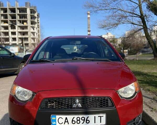Красный Мицубиси Кольт, объемом двигателя 1.3 л и пробегом 110 тыс. км за 6500 $, фото 1 на Automoto.ua