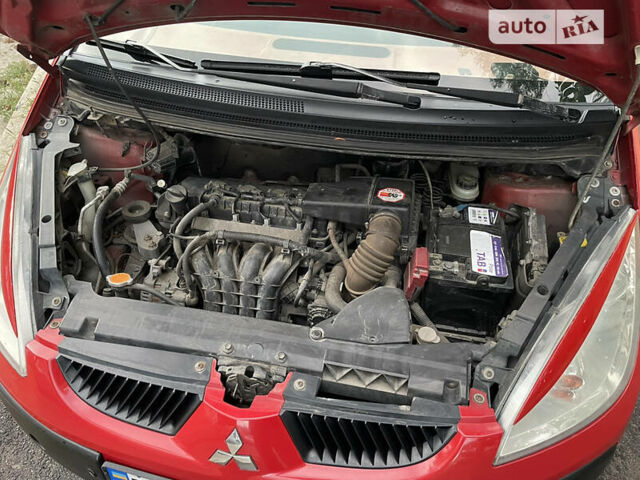 Красный Мицубиси Кольт, объемом двигателя 1.3 л и пробегом 150 тыс. км за 3750 $, фото 24 на Automoto.ua