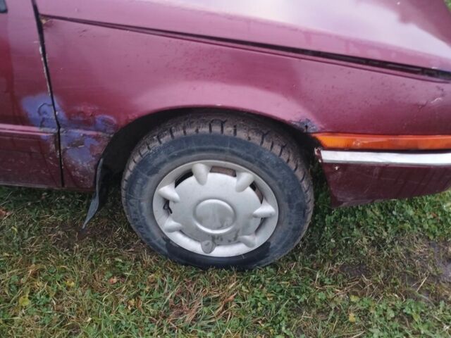 Красный Мицубиси Кольт, объемом двигателя 1.5 л и пробегом 12 тыс. км за 310 $, фото 3 на Automoto.ua