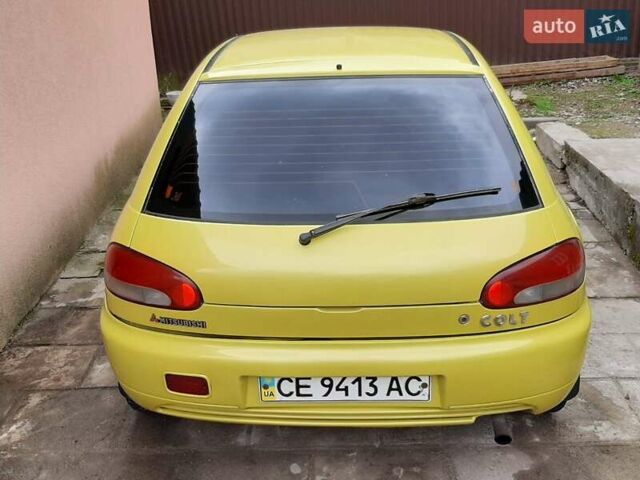 Желтый Мицубиси Кольт, объемом двигателя 1.3 л и пробегом 80 тыс. км за 1600 $, фото 2 на Automoto.ua