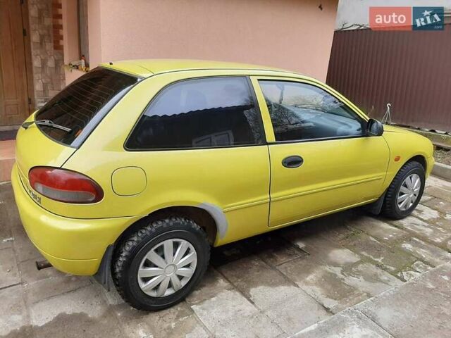 Желтый Мицубиси Кольт, объемом двигателя 1.3 л и пробегом 80 тыс. км за 1600 $, фото 1 на Automoto.ua
