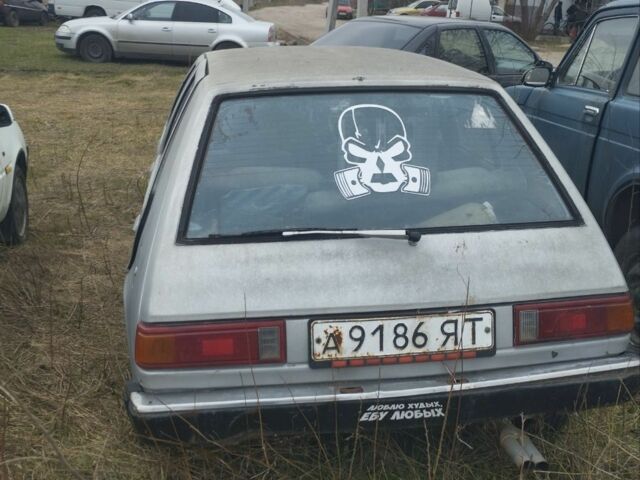 Серый Мицубиси Кольт, объемом двигателя 1.2 л и пробегом 100 тыс. км за 262 $, фото 3 на Automoto.ua