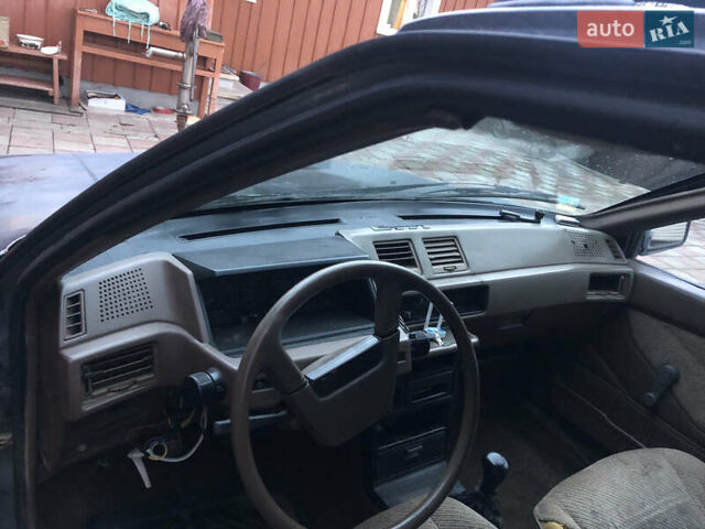 Серый Мицубиси Кольт, объемом двигателя 1.5 л и пробегом 290 тыс. км за 399 $, фото 2 на Automoto.ua