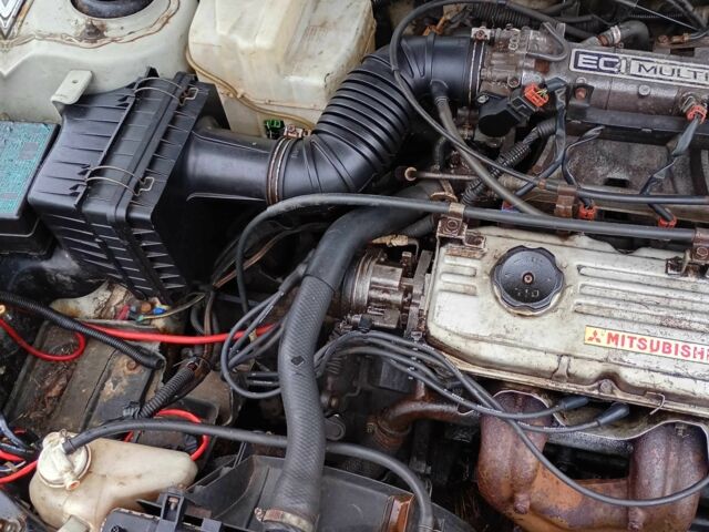 Сірий Міцубісі Кольт, об'ємом двигуна 1 л та пробігом 100 тис. км за 945 $, фото 8 на Automoto.ua