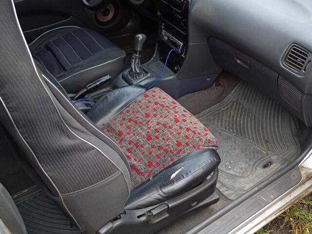 Сірий Міцубісі Кольт, об'ємом двигуна 1 л та пробігом 100 тис. км за 945 $, фото 4 на Automoto.ua