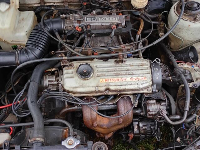 Сірий Міцубісі Кольт, об'ємом двигуна 1 л та пробігом 100 тис. км за 945 $, фото 7 на Automoto.ua