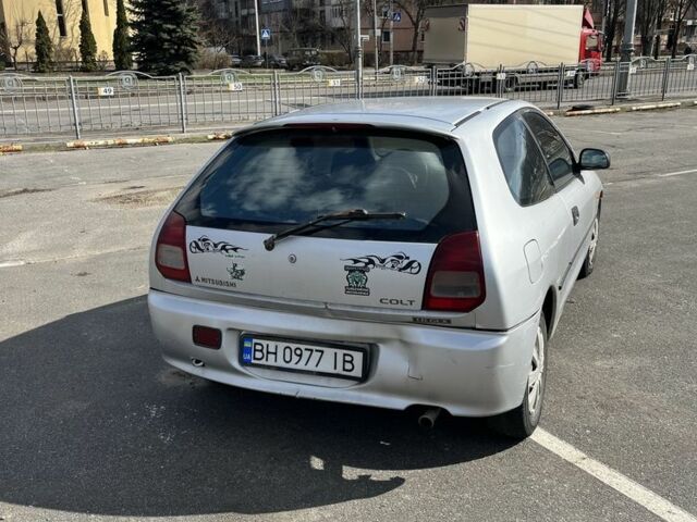 Серый Мицубиси Кольт, объемом двигателя 1.6 л и пробегом 316 тыс. км за 800 $, фото 4 на Automoto.ua