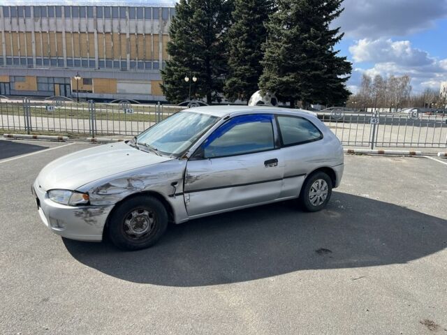 Серый Мицубиси Кольт, объемом двигателя 1.6 л и пробегом 316 тыс. км за 800 $, фото 2 на Automoto.ua