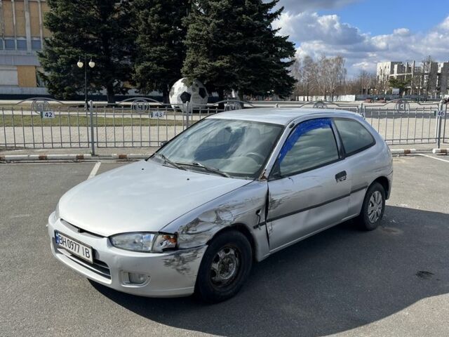 Серый Мицубиси Кольт, объемом двигателя 1.6 л и пробегом 316 тыс. км за 800 $, фото 1 на Automoto.ua