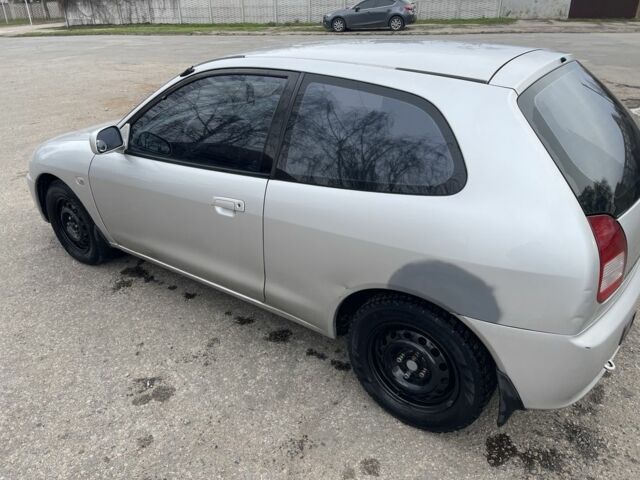 Серый Мицубиси Кольт, объемом двигателя 1.6 л и пробегом 203 тыс. км за 3550 $, фото 3 на Automoto.ua