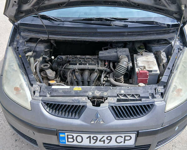 Сірий Міцубісі Кольт, об'ємом двигуна 1.33 л та пробігом 251 тис. км за 2600 $, фото 13 на Automoto.ua